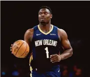  ?? Sarah Stier/tns ?? Pelicans forward Zion Williamson scored 36 points in New Orlean’s 114-101 win over short-handed Detroit.