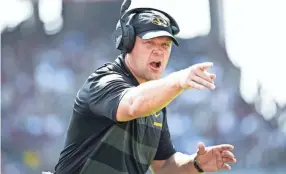  ??  ?? Missouri coach Barry Odom spent three years as Memphis' defensive coordinato­r and still has fond memories of the program. FILE / AP