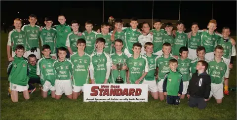  ??  ?? Naomh Eanna celebrate after Wednesday’s Under-14 football Division 1 championsh­ip success.