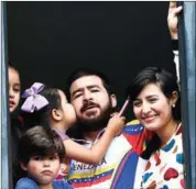  ?? JUAN BARRETO/AFP ?? Former mayor of San Cristobal Daniel Ceballos with his family on August 12, 2015.