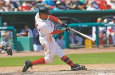  ?? JOHN BAZEMORE/ASSOCIATED PRESS ?? The Red Sox’s Mookie Betts connects on a solo-home run in the seventh inning of a spring training game Saturday against the Braves in Fort Myers, Fla.