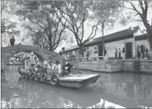  ?? GUO ZHIHUA / FOR CHINA DAILY ?? Tongli town in Suzhou, Jiangsu province, is usually a popular tourist site during the Labor Day holiday in May.