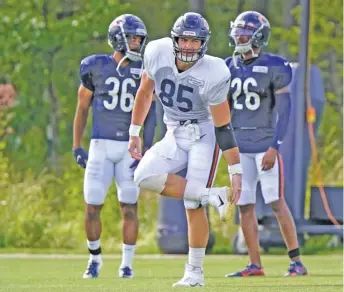  ?? AP ?? Jimmy Graham (left) and rookie Cole Kmet (right) have looked sharp at practice. Graham had a better stat line than all of the Bears tight ends combined last season and Kmet appears to be advancing quickly in his developmen­t.