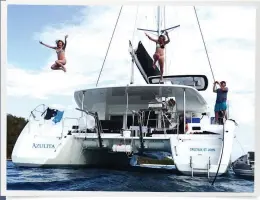  ??  ?? Maddy and Lily can’t resist a leap off Azulita’s Bimini on our last night at Isla Palominos (below). Ensenada Honda, on Culebra, was the busiest anchorage we visited (right). El Faro, on Culebrita, was constructe­d in 1880 (opposite).