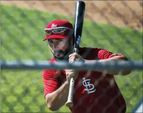  ?? COLTER PETERSON — THE ASSOCIATED PRESS ?? Cardinals designated hitter Matt Carpenter works on his swing while waiting on his turn in batting practice in Jupiter, Fla. on Feb. 26.