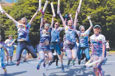  ?? FUN TIMES: ColorRun participan­ts had a ball in the Townsville Color Run along the Strand. Picture: WESLEY MONTS ??