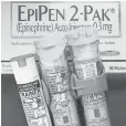  ?? JOE RAEDLE, GETTY IMAGES ?? EpiPen two- packs cost $ 600. The generic will cost $ 300.