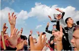  ??  ?? Palestinia­n protesters chant slogans during clashes with Israeli soldiers near the border fence east of Gaza City on Dec 29. AFP