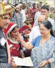  ??  ?? CM Vasundhara Raje blesses one of the Mahila Sadan residents, who got married at a ceremony, in Jaipur on Friday. HT PHOTO