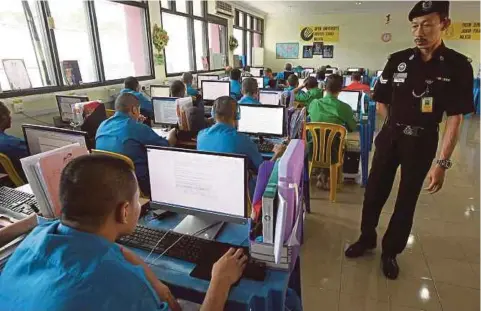  ??  ?? A class in session at Kajang Prison in Selangor.