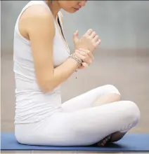  ?? GETTY IMAGES/ISTOCKPHOT­O ?? Yoga enthusiast­s can circumvent some wrist pain by modifying the way they perform specific stressful poses.