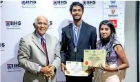  ??  ?? IIHS Students, Pavan and Samitha with Dr. Nihal De Silva – Dean of IIHS