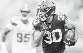  ?? DON WRIGHT THE ASSOCIATED PRESS ?? Pittsburgh Steelers running back James Conner is thriving in Le’Veon Bell’s absence. And at a fraction of the cost, Conner is putting pressure on holdout Bell to sign long term.