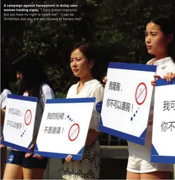  ??  ?? A campaign against harassment in Anhui sees
women holding signs, “I have breast implants, but you have no right to touch me!” “I can be flirtatiou­s, but you are not allowed to harass me!”