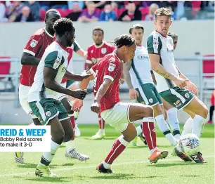  ??  ?? REID & WEEP Bobby Reid scores to make it 3-0