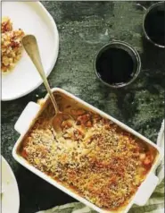  ?? PHOTO COURTESY OF ASHLEY RODRIGUEZ AND BOONE RODRIGUEZ ?? White bean and pumpkin gratin with crispy shallot crumbs Ground cinnamon or toasted cinnamon sticks, for garnish