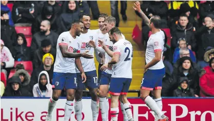  ?? Photo: Zimbio ?? Joshua King of AFC Bournemout­h celebrates with team-mates after scoring their third goal during the English Premier League clash against Watford FC at Vicarage Road in United Kingdom on October 6, 2018.