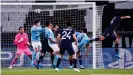  ??  ?? Marquinhos, far right, puts PSG ahead with a glancing header — his fifth goal in his last 12 Champions League games.