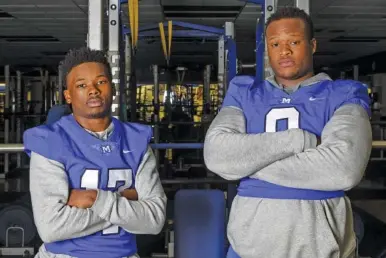  ?? STAFF PHOTO BY C.B. SCHMELTER ?? McCallie quarterbac­k DeAngelo Hardy, left, and defensive end Jay Hardy are cousins who have been central to the Blue Tornado’s success this season, which includes a No. 1 seed for the TSSAA Division II-AAA playoffs.