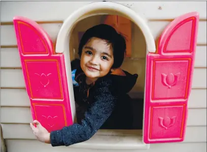  ?? RANDY VAZQUEZ — BAY AREA NEWS GROUP ?? Santos Ezekiel Mendoza-Ibarra, 2, plays inside a miniature house at Pajaro Valley Shelter Services in Watsonvill­e in October.