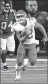  ?? AP/CHUCK BURTON ?? Kansas City Chiefs running back Spencer Ware rushed for 29 yards on 14 carries Sunday in Atlanta. He also caught 3 passes for 23 yards and 2 touchdowns in the Chiefs’ 29-28 victory.