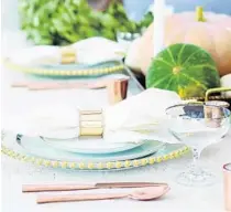  ?? BRE DOUCETTE ?? “Setting a table goes way beyond the centerpiec­e,” says author and blogger Bre Doucette. “You’re creating an experience for the people you love, and it should touch all the senses.”