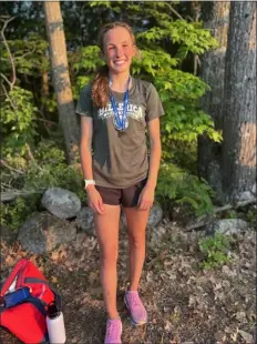  ?? COURTESY PHOTO ?? Billerica High senior Anna Mcelhinney captured the two mile race in a time of 11:05.55 at the Meet of Champions in Fitchburg.