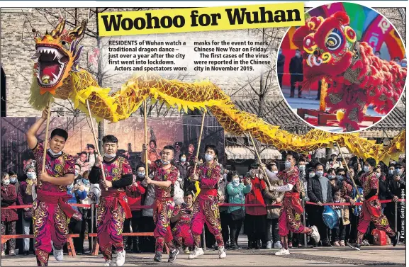  ??  ?? RESIDENTS of Wuhan watch a traditiona­l dragon dance – just over a year after the city first went into lockdown.
Actors and spectators wore