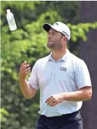 ?? ROB SCHUMACHER/USA TODAY SPORTS ?? New first-time father Jon Rahm fit in a practice round Wednesday.