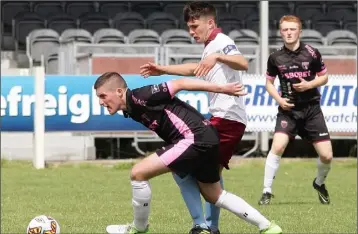  ??  ?? Wexford’s Cian Doyle breaks away from Cian Buckley of Galway.