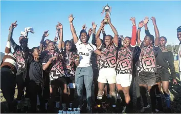  ?? Picture: ZINTLE BOBELO ?? JUBILANT: The Kwa-Komani Technical School rugby team celebrate claiming the top spot at the high schools rugby league final.