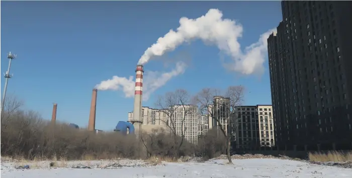  ?? Reuters ?? A coal-fired heating complex in China. The Internatio­nal Energy Agency called on countries not to invest in new fossil fuel developmen­ts to attain their carbon-reduction goals by 2050