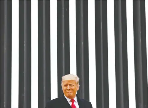  ?? CARLOS BARRIA / REUTERS ?? In his first public appearance since the violence in Washington, Donald Trump Tuesday visited a section of U.S.-Mexico border fencing in Texas.