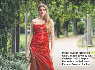  ?? ?? Model Hunter Richtsfeld wears a satin gown by local designer Dada's Step at Munro Martin Parklands. Picture: Brendan Radke