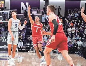  ?? DAVID BANKS / USA TODAY SPORTS ?? Wisconsin guard Johnny Davis reacts after sinking a three-pointer Tuesday night at Northweste­rn.