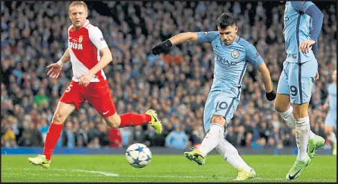  ??  ?? Sergio Aguero fires Manchester City into the lead during their 5-3 victory over Monaco at the Etihad Stadium last night