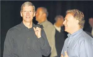  ?? BLOOMBERG ?? File photo of Apple chief executive officer Tim Cook (left) with Philip Schiller, the company’s former chief marketing officer.