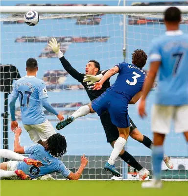  ?? Photo: AP ?? Chelsea's Marcos Alonso scores the winning goal against City during their English Premier League clash at Etihad Stadium in Manchester.