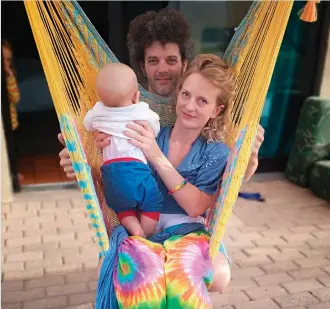  ??  ?? Erik Vorster with his wife Jen Stiehler and four-months-old baby. Photo: Kristy Kolberg