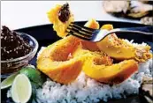 ??  ?? Roasted pumpkin is topped with pipian rojo.