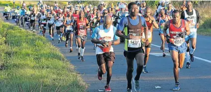  ?? Picture: GALLO IMAGES ?? ALL OUT EFFORT: Top athletes set the pace during the 2018 Comrades Marathon up the tough hills