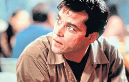  ?? Something Wild ?? Liotta, above, as Henry Hill in Goodfellas, and below, with Melanie Griffith in his break-out film