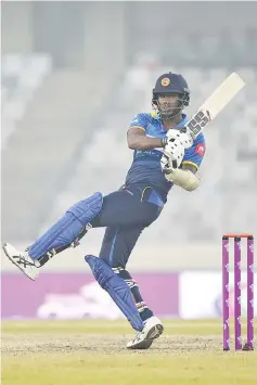  ?? — AFP photo ?? In this file photo taken on January 17, 2018 Sri Lanka cricket captain Angelo Mathews plays a shot during the second one day internatio­nal (ODI) cricket match of the Tri-Nations Series between Sri Lanka and Zimbabwe at the Sher-e-Bangla National...