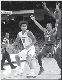  ?? NWA Democrat-Gazette/ANDY SHUPE ?? Arkansas guard Anton Beard (31), a graduate of Little Rock Parkview, is one of three players from central Arkansas who are expected to play in tonight’s game against Troy at Verizon Arena in North Little Rock. The other two are senior Daryl Macon and...