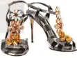  ??  ?? Dolce & Gabbana patent leather sandals, £495.
