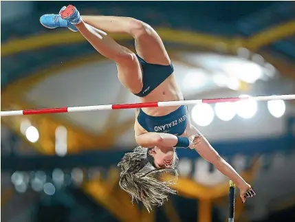  ?? PHOTOSPORT ?? Eliza McCartney is in rarified air in the pole vault – only three women have leapt higher than the Kiwi.