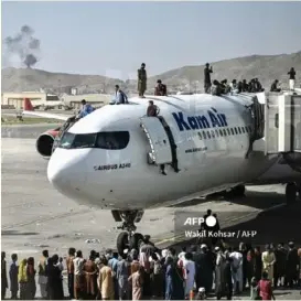  ?? AFP ?? Al menos cinco personas murieron tratando de huir en un vuelo.