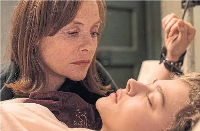  ?? JONATHAN HESSION TRIBUNE NEWS SERVICE ?? Isabelle Huppert, left, and Chloe Grace Moretz in Greta, directed by Neil Jordan. Huppert’s performanc­e is wonderfull­y conceived.