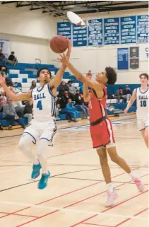  ?? STEVE SMITH/COURTESY ?? Manchester’s Quentin Ford, shown against Hall, had a 25-point game against Tolland last week.