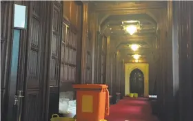  ?? AFP/U.K. Parliament 2016 ?? Buckets catch water from a leaking ceiling following heavy rains in 2016 at the Palace of Westminste­r, the historic palace that houses Parliament.